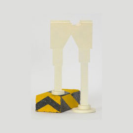 <i>Over Here, 2009</i>, monochrome wood,  polychrome brick 12.5" x 8" x 6.5"